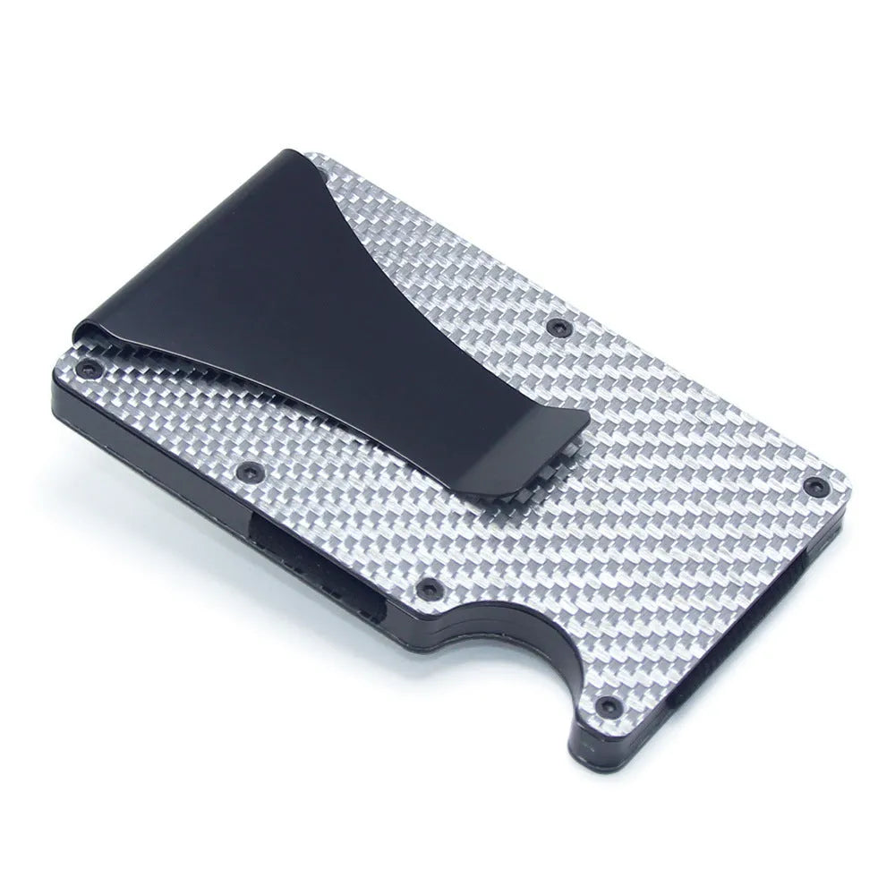 Geometric carbon fibre and aluminium slim card holder wallet in multiple colour options on a table.