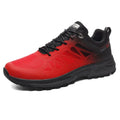 Men's black breathable mesh running shoes with orange accents and a rubber sole