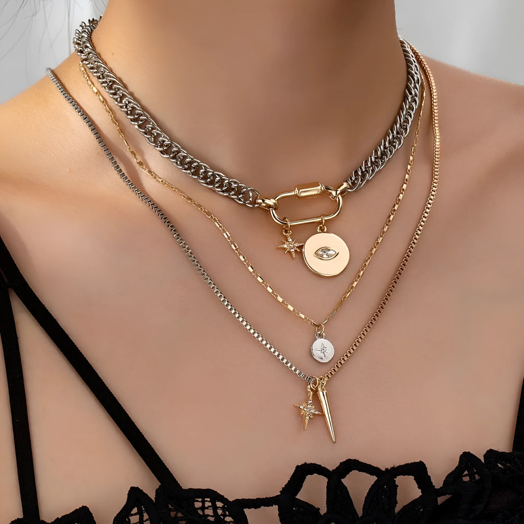 Alloy multi-layer twin necklace with geometric elliptical pendant on a white background