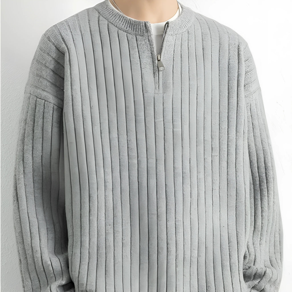 Men's grey half-zip textured knit pullover sweater with loose fit and long sleeves