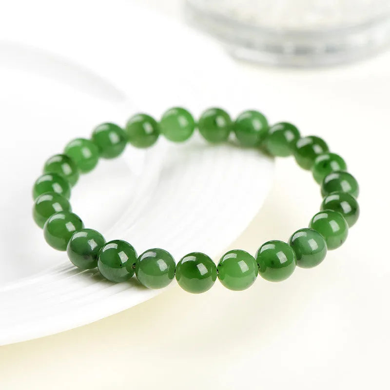 Natural Jasper and Hetian jade bead bracelet showing polished stone beads in one of five available sizes.