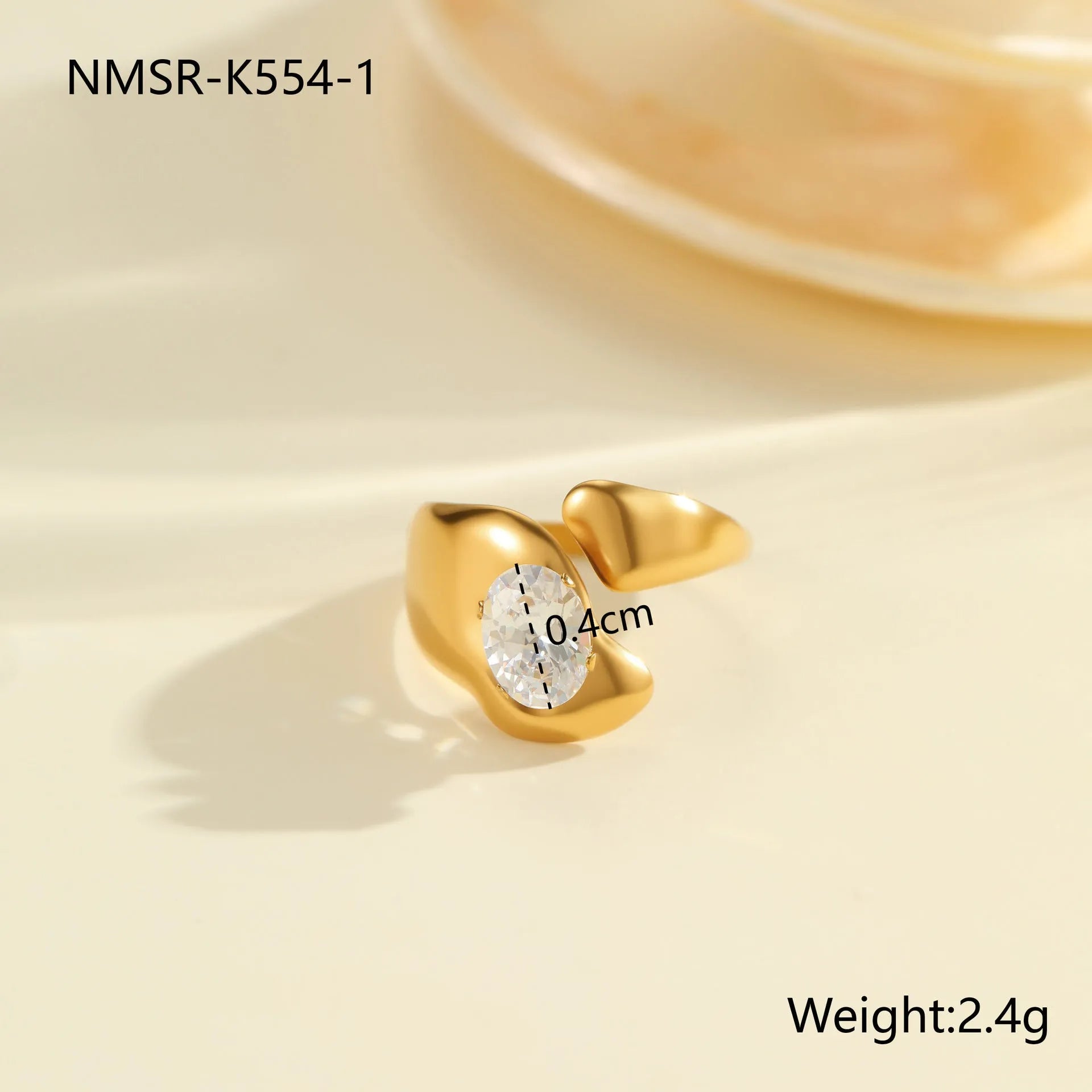 Adjustable geometric stainless steel ring showing open mouth design and colour variations