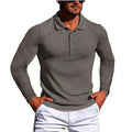 A striped, short sleeve, loose fit knit summer shirt on a hanger, available in multiple colours.