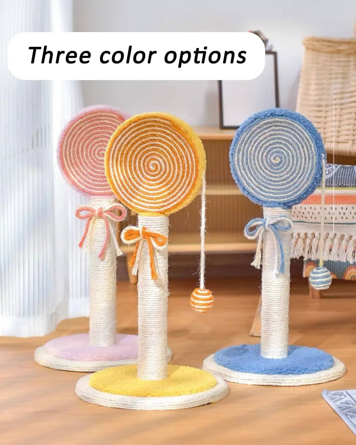Blue cat scratching post with sisal rope and a hanging yellow ball on a sturdy base.