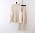 Women's casual two-piece set showing sweater and wide leg trousers in solid colour with thread detail