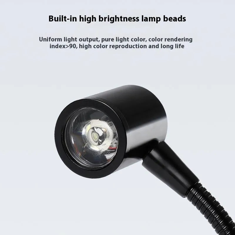LED moss plant lamp with copper body, USB cable, round base white light, on a desk near a small acrylic fish tank