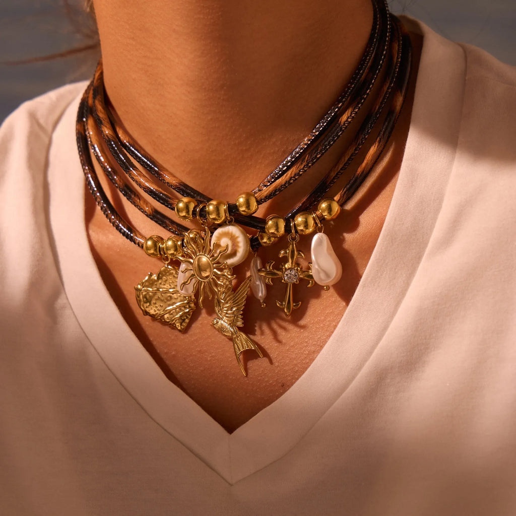 Women's stainless steel necklace with leopard print geometric pendant and gold electroplated finish