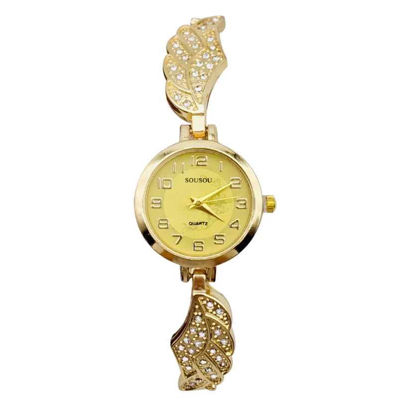 Women's stainless steel watch with round dial on wrist, showing Vachette clasp.