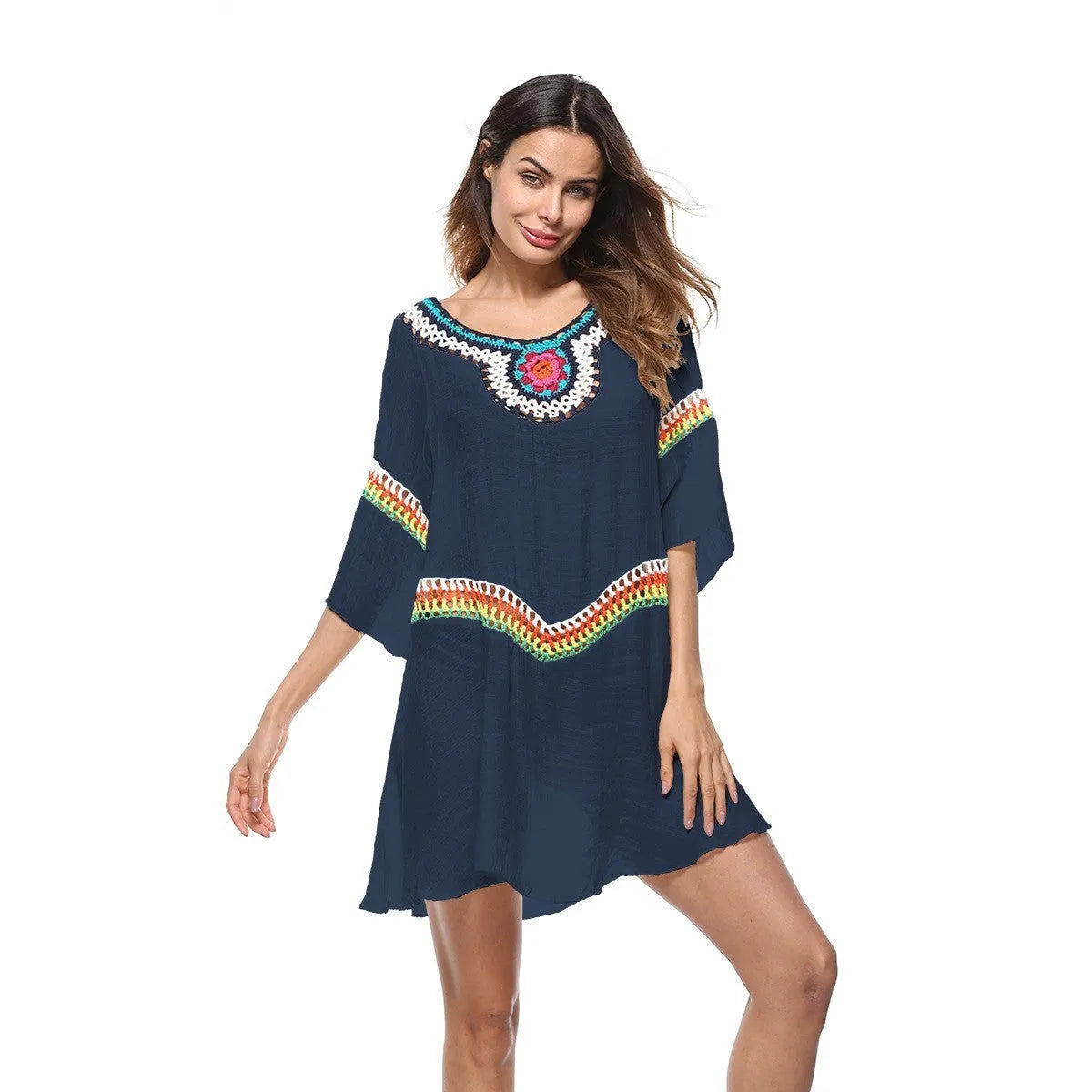 Women's crocheted ethnic style sun protection clothing in apricot colour with beach background