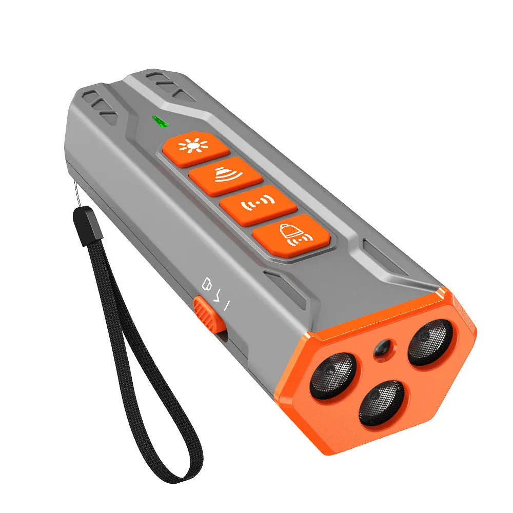 Handheld three-head ultrasonic dog trainer in black and orange colour scheme