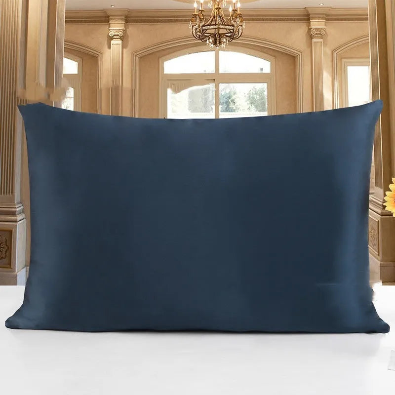 Double-sided silk pillowcase in apricot colour showing smooth satin weave texture.