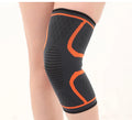 Double corrugated non-slip sports kneecaps in various colours on a grey background.