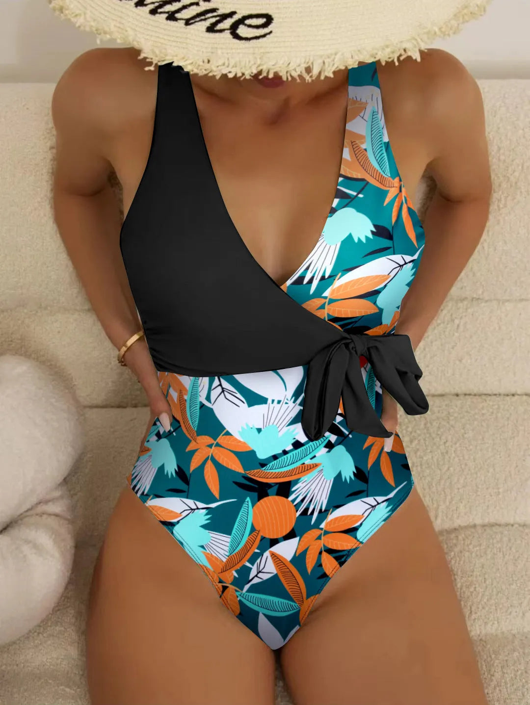 Women's high-waist one-piece swimsuit with an all-over printed pattern in a conservative style.