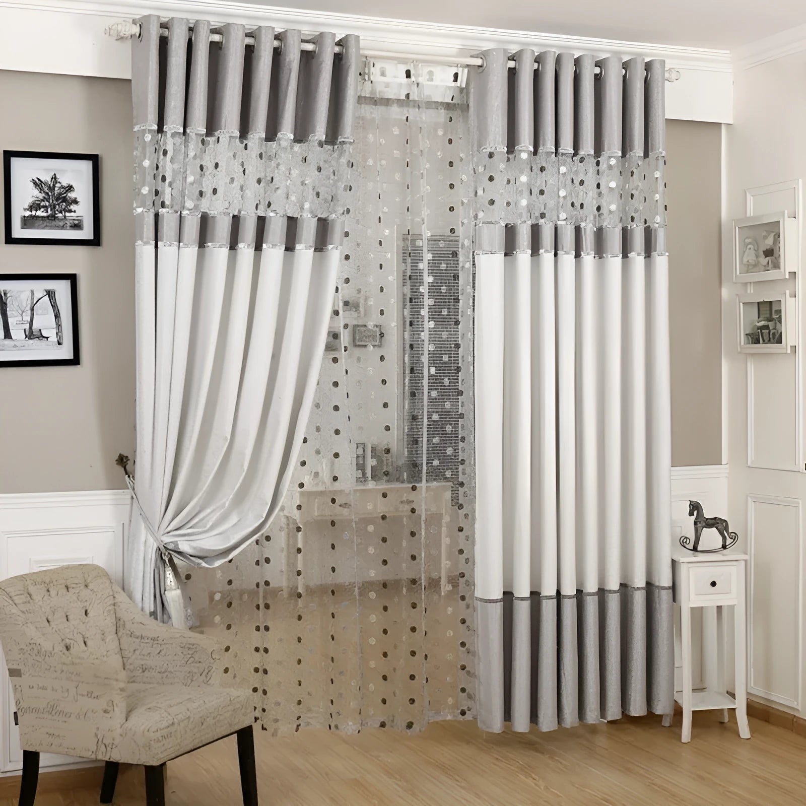 A single blackout curtain panel hung on a track, demonstrating its light-blocking fabric and hook-style header.