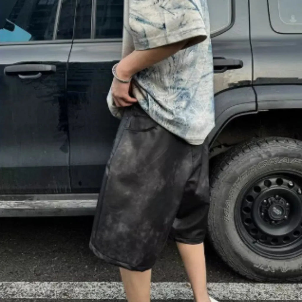 Korean-style loose fit T-shirt with distressed summer wash and tie dye print on solid colour polyester.