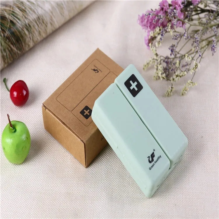 Four-color magnet 7-grid pill box in solid blue colour showing foldable covered design with seven compartments