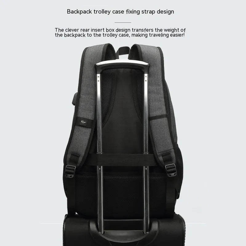 Grey lightweight backpack with USB charging port on the side, showing trolley sleeve on back