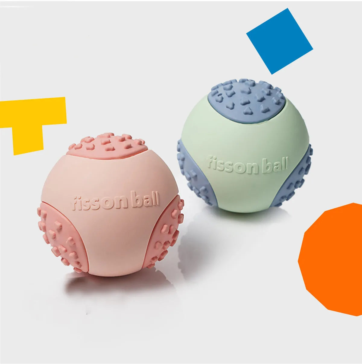 Green and pink rolling ball dog toy with 64mm diameter for small and medium dogs.