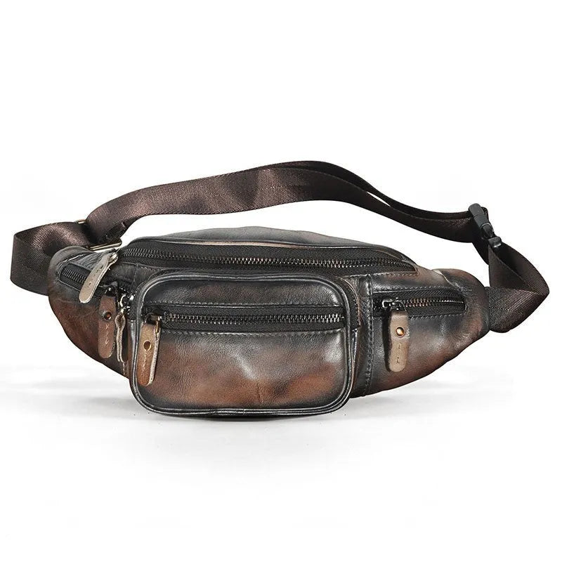 Brown leather shoulder messenger bag with a single strap and magnetic buckle closure.
