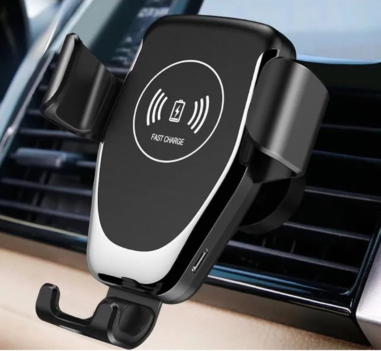 Black car wireless charger mounted on dashboard charging iPhone automatically