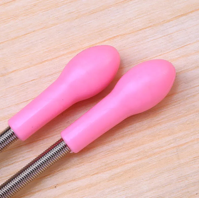 Pink facial hair remover with stainless steel spring and plastic handles, 19cm long, on a light background