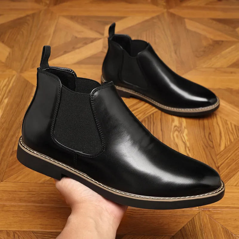 Men's black formal leather pointed-toe boots with square heel on neutral background