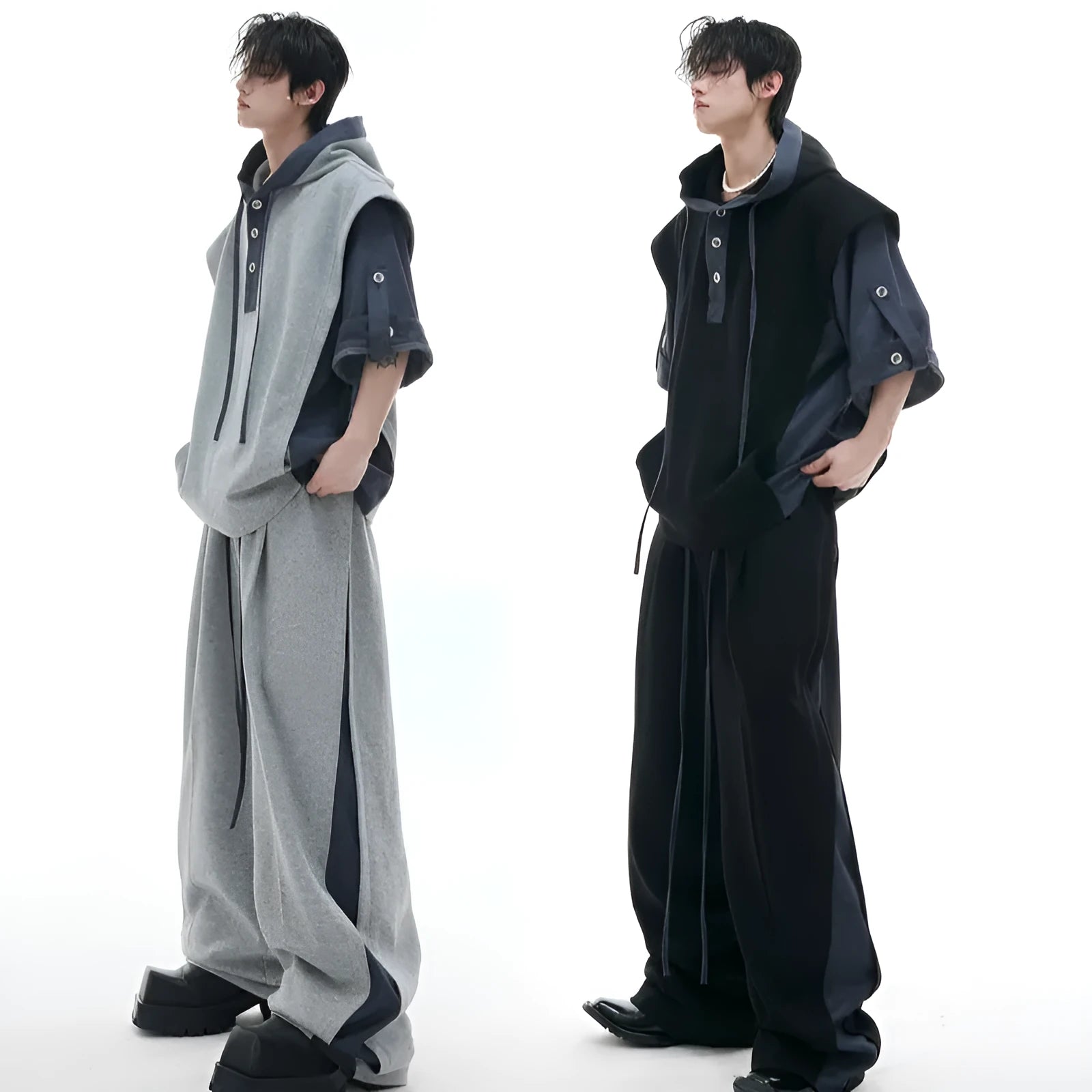 Men's black and grey polyester tracksuit with hooded jacket featuring three-dimensional stitching design