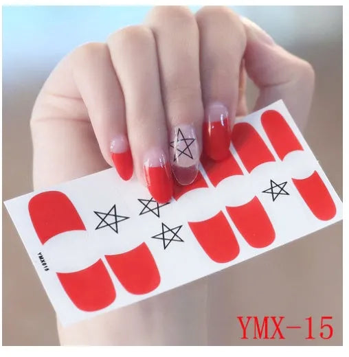 Full nail stickers set of 14 sheets showing 16 colour options in a flat lay arrangement