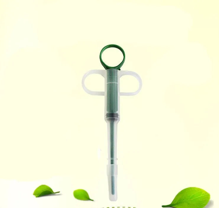 Red and blue pet medicine pills feeder device 15cm long with plastic and silicone construction