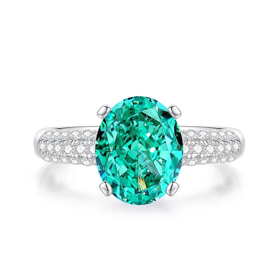 S925 silver emerald ring for women with a geometric design and an inlaid high carbon diamond centre stone.
