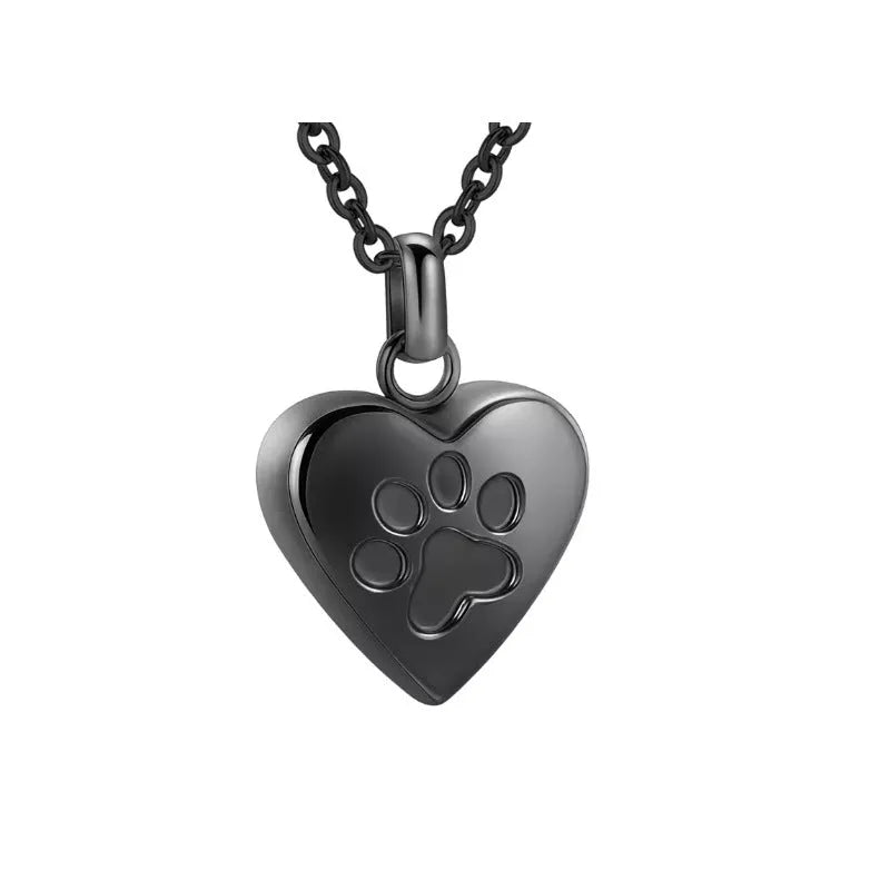 Simple openable heart casket necklace in titanium steel, shown on a chain.