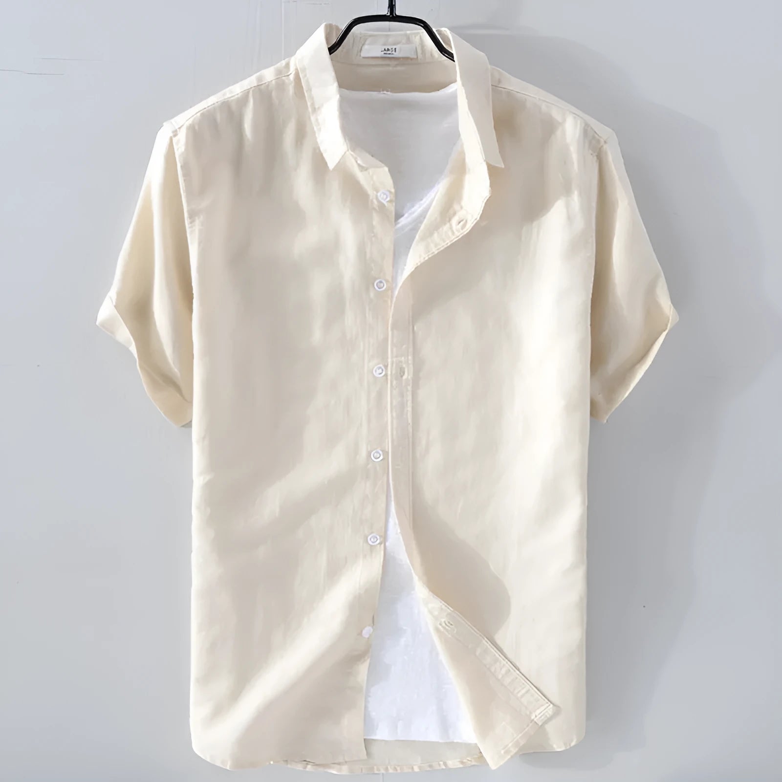 Men's loose fit short sleeve shirt in a cotton linen blend fabric, shown in a solid colour.