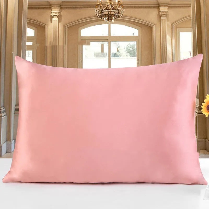 Double-sided silk pillowcase in apricot colour showing smooth satin weave texture.