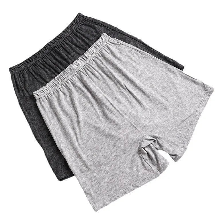 Solid colour high-waist men's modal boxers in black, brown, grey, and blue on a white background