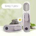 Blue portable dog water bottle with a grey silicone folding drinking bowl attached, for outdoor use.