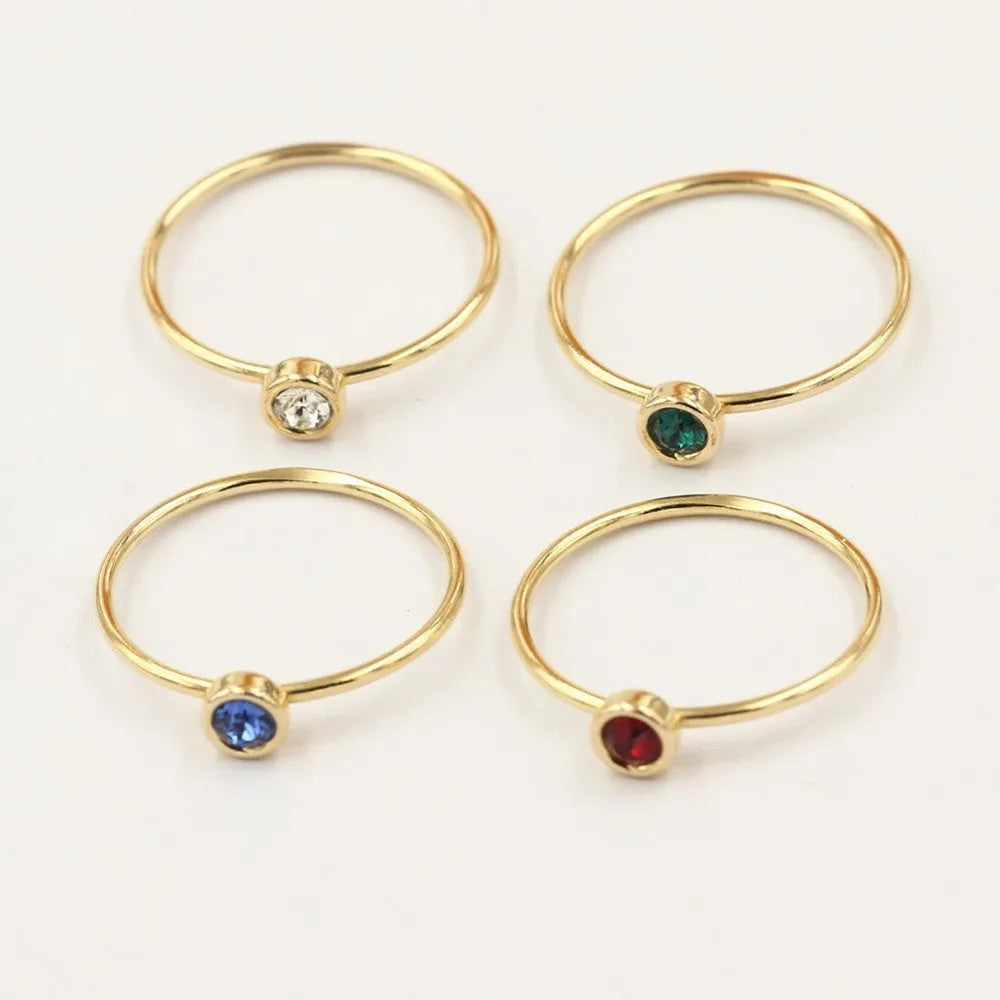 Women's 14K gilded zircon knuckle ring on copper body in green, blue, dark red or white