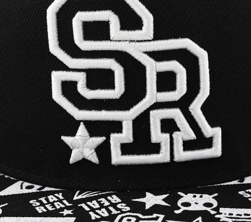 Cotton baseball cap with embroidered letters showing dome crown and adjustable back strap