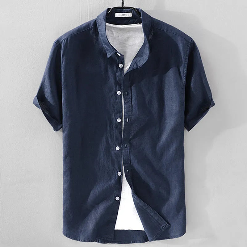 Men's loose fit short sleeve shirt in a cotton linen blend fabric, shown in a solid colour.