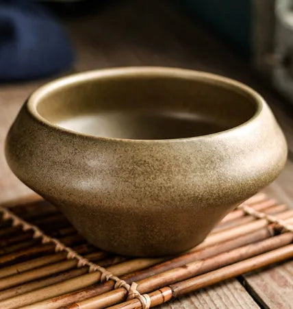 Ceramic Japanese soup bowl with stone conch shape and traditional Edo pattern design