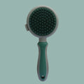 Green and pink 2-in-1 silicone pet grooming brush with retractable slicker and octopus-teethed massager