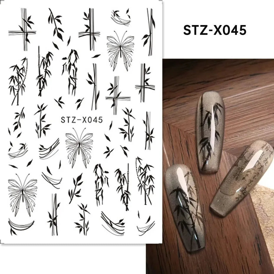 Pack of black and silver striped nail art stickers with cartoon and love pattern designs.
