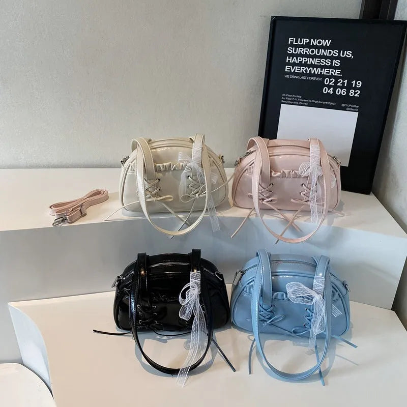 Women's casual PU shoulder handbag with a bandage bow and internal phone pocket in beige, black, blue, or pink.
