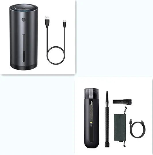 Black cordless handheld car vacuum cleaner with blowing hose attachment on a desktop.