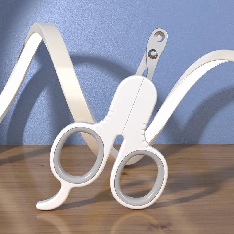 Professional grey pet nail clippers with curved tips and rubber-coated ergonomic handle.