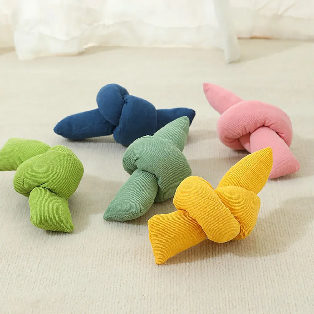 White natural cotton dog rope toy with multiple knots for tug-of-war play and dental flossing