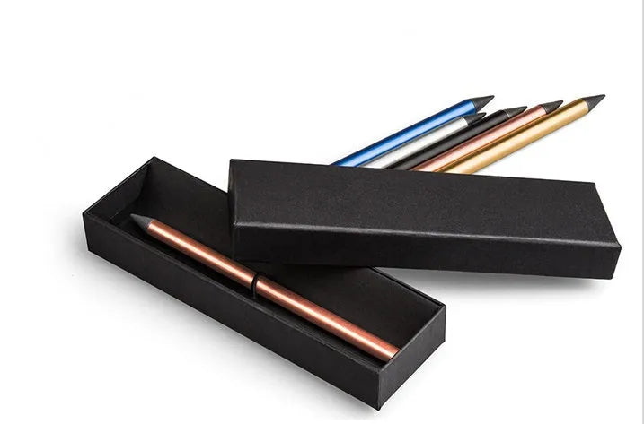 Silver inkless metal pen with 0.5mm nib, spare nib, and black pen bag on wooden table.