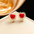 Gold red titanium steel necklace, earrings, and ring set with heart flower pendants and gem inlays.