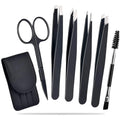 Six-piece stainless steel eyebrow tweezer set with slanted tips, curved scissors, brush, and leather case