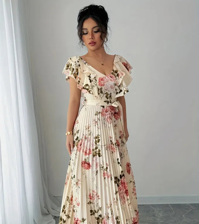 Apricot floral print women's dress with V-neck, ruffled sleeves, and oversized swing skirt