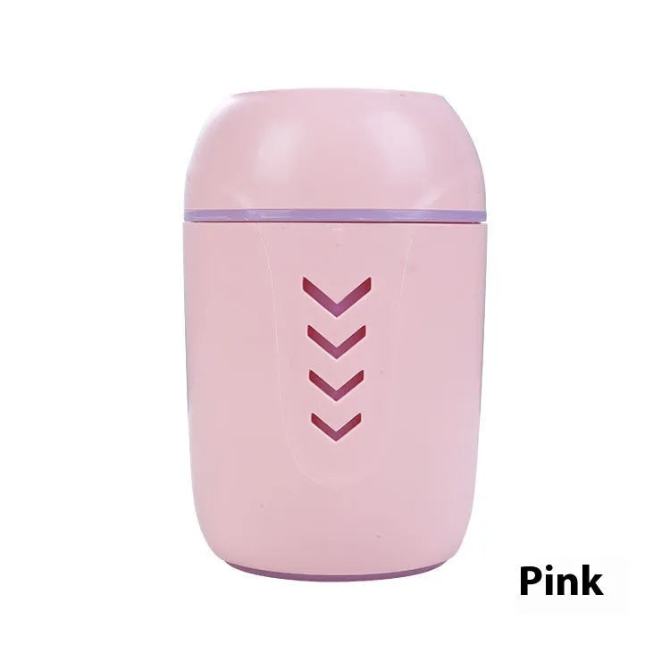Round white portable air purifier with USB cable on a car dashboard